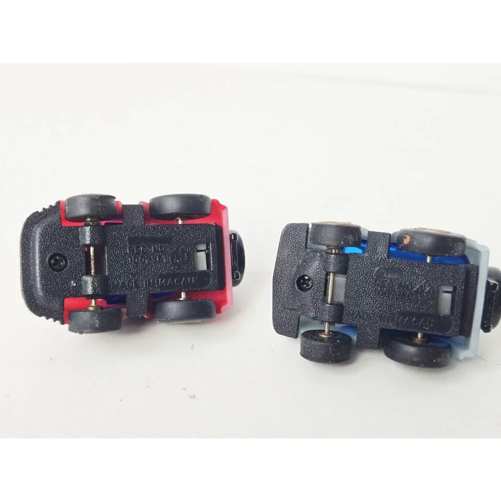 Vintage MC Toy pull back race car pair